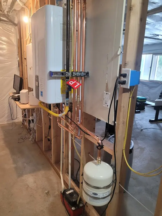 Licensed plumber repairing a kitchen sink in Covington